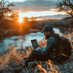Homme travaillant sur son ordinateur portable au bord d'une rivière au coucher du soleil — illustration de la visioconsultation